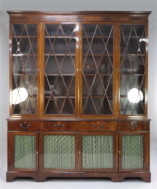 An Edwardian mahogany and boxwood strung four door bookcase, W.6ft 11in.